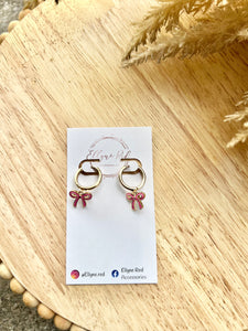 Pink bow hoop earrings